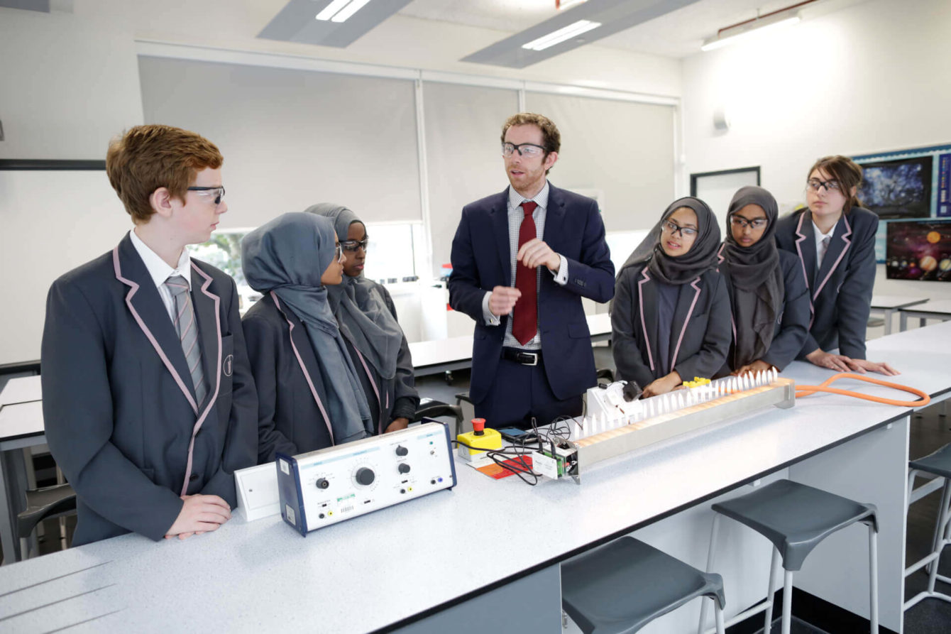 teacher with school students